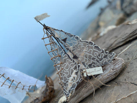 Velieri con legni di mare