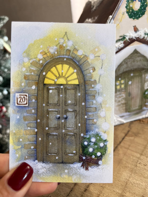 Le porte dell'avvento con casetta