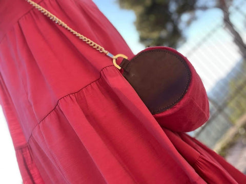 Cappello ciliegia e borsa bauletto