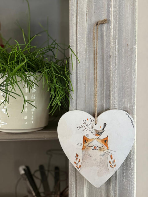 cuori di legno dipinti a mano